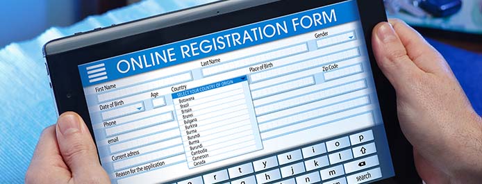 An online registration form on laptop screen