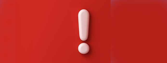 White exclamation point on a red background.